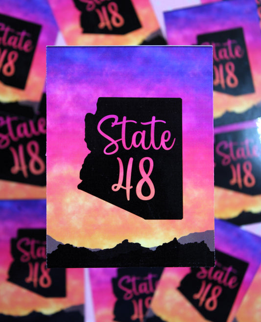 State 48 with gradient backdrop of a sunset on mountains - beautiful sticker!