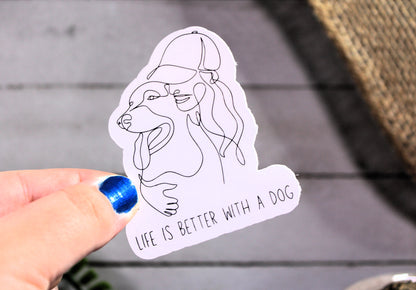 "Life is better with a dog" Outline of a girl with her dog. - Decal/ Sticker perfect for laptops, water bottles and more!